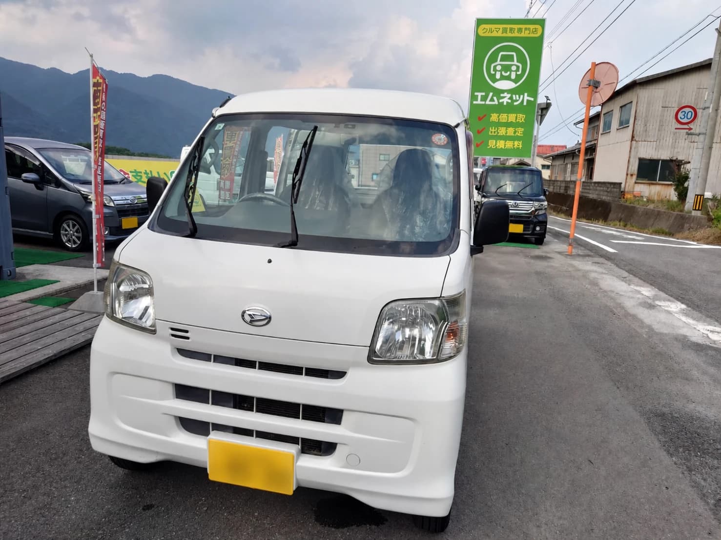 白いダイハツ ハイゼットカーゴ スペシャル 4WDの正面外観